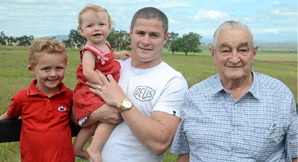 SUPER SAINT: Travis Burns (middle) returns home from another year of Super League with his children Jake and Poppy Burns and grandfather Don Schwenke. SUPER SAINT: Travis Burns (middle) returns home from another year of Super League with his children Jake and Poppy Burns and grandfather Don Schwenke.